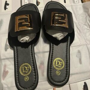 Black Slide Sandals with Gold Accent - DF Logo